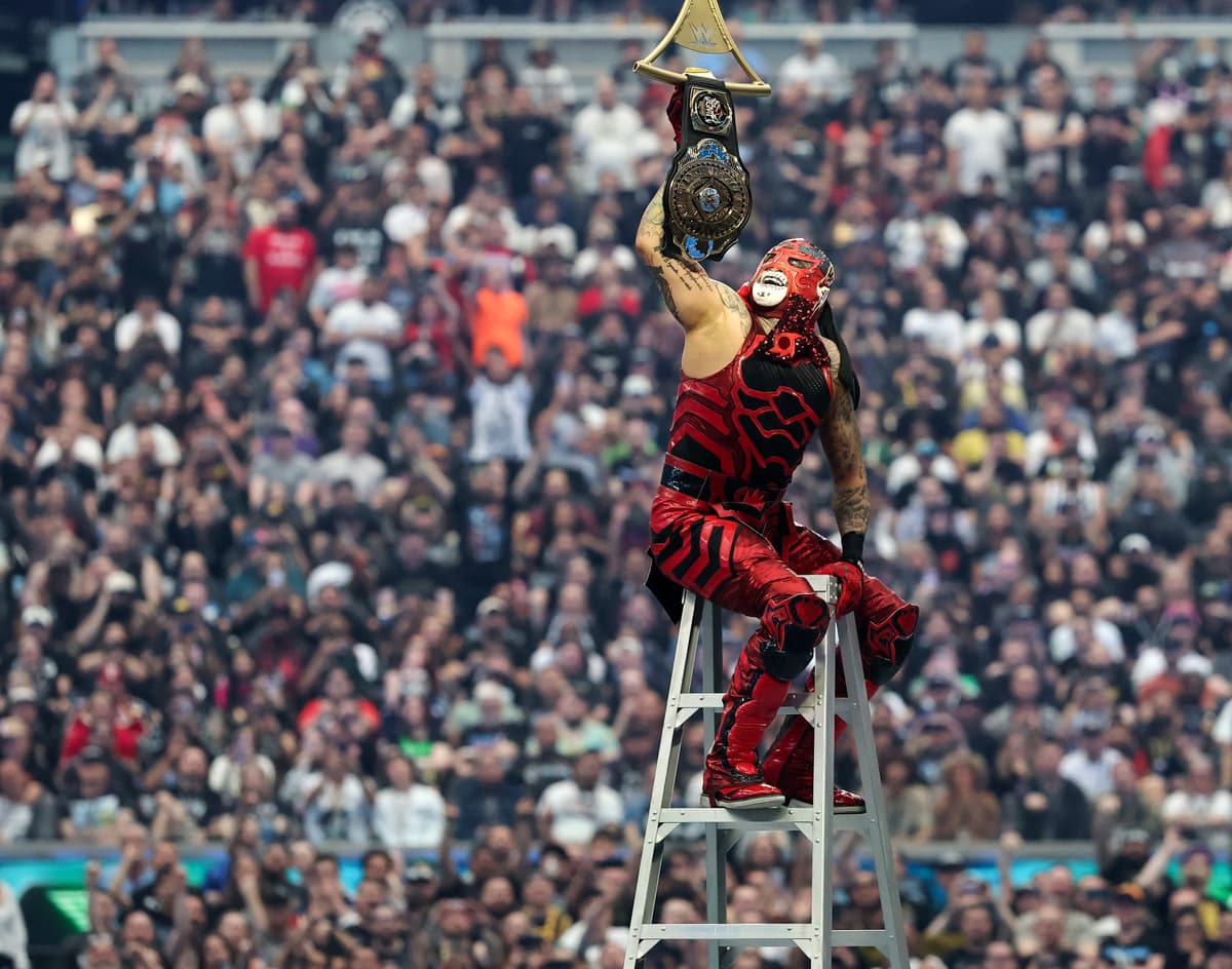 Ethan Miller/Getty Images Penta grabs the belt to win the Intercontinental Championship Ladder match against Je’Von Evans, Dragon Lee, JD McDonagh, Rusev and Rey Mysterio during WrestleMania 42 at Allegiant Stadium on April 19, 2026 in Las Vegas.