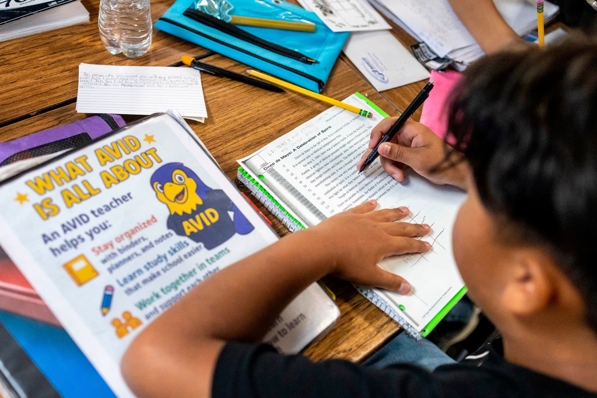 Annie Barker/AP A sixth-grader reads a passage during a class at Fairview Elementary School at Modesto, California, on May 6, 2026.