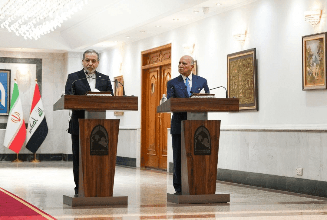 Iran's Fars News Agency via X Foreign ministers Abbas Araghchi of Iran and Fuad Hussein of Iraq speak to reporters at a press conference at Baghdad on June 28, 2026.