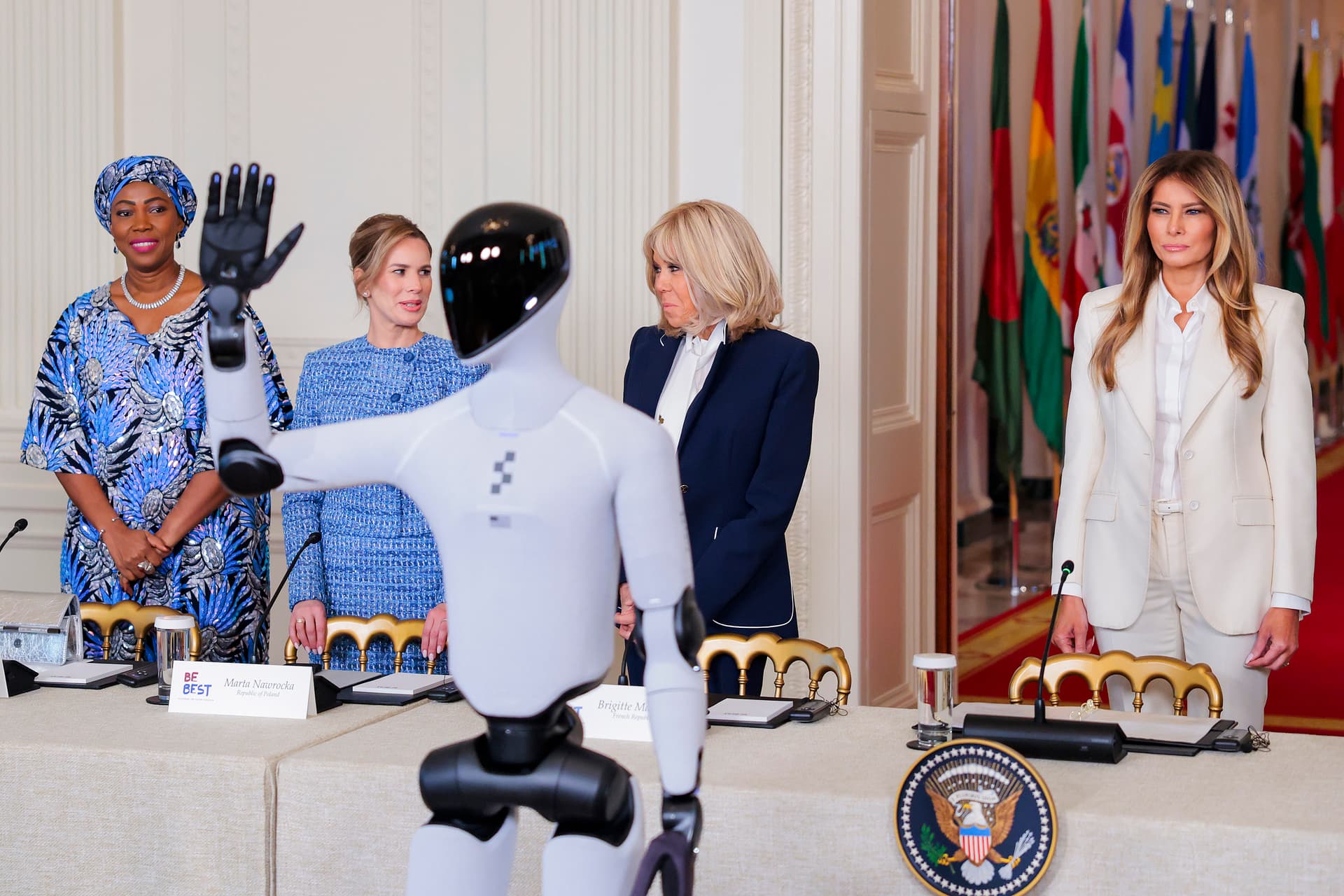 Heather Diehl/Getty Images First lady Melania Trump hosts first lady of Sierra Leone, Fatima Maada Bio, first lady of Poland, Marta Nawrocka and first lady of France, Brigitte Macron in the East Room at the White House on March 25, 2026.