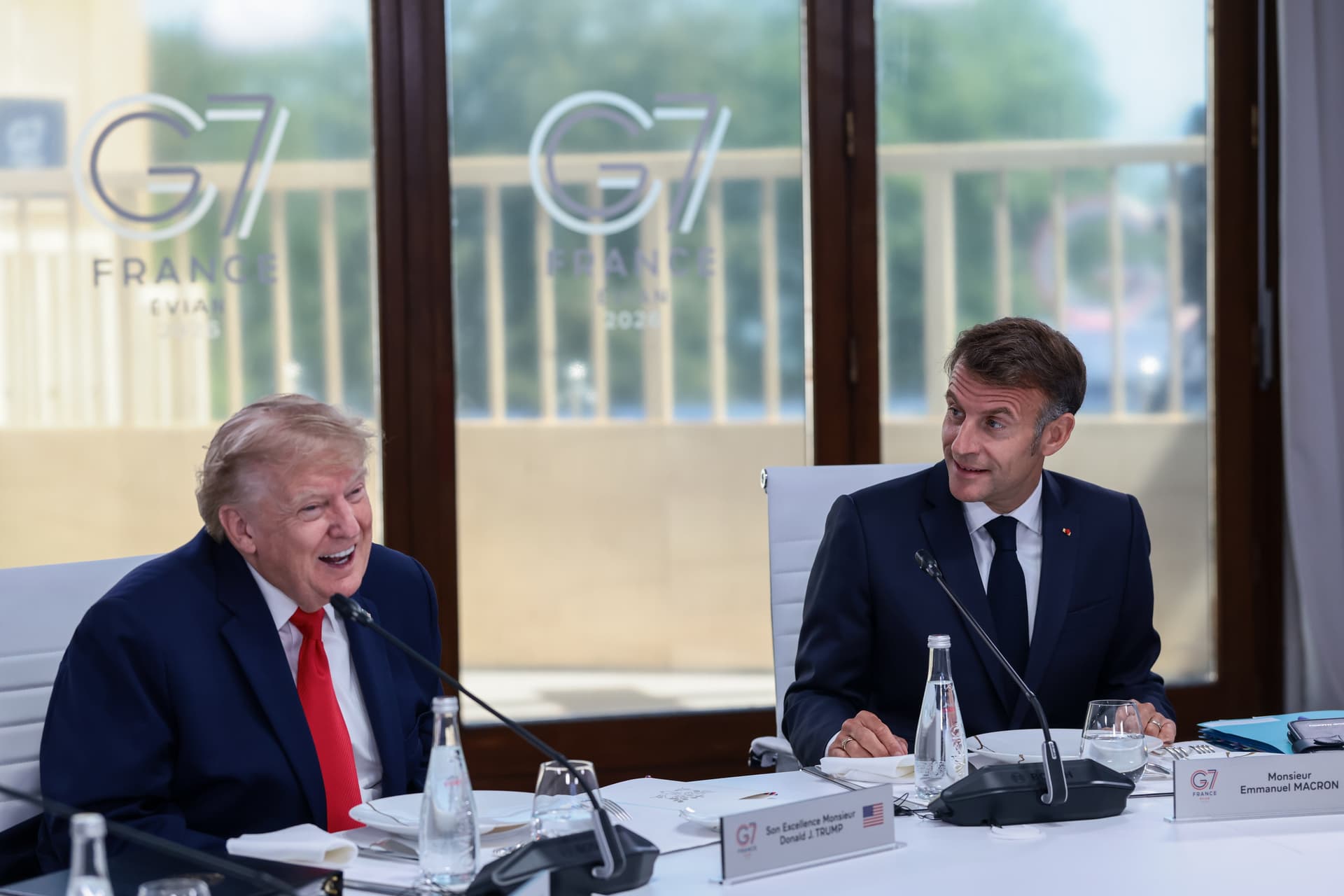Evelyn Hockstein/Getty Images President Trump and President Emmanuel Macron attend a working lunch with leaders of G7 and the Middle East, on June 16, 2026 at Evian-les-Bains, France.