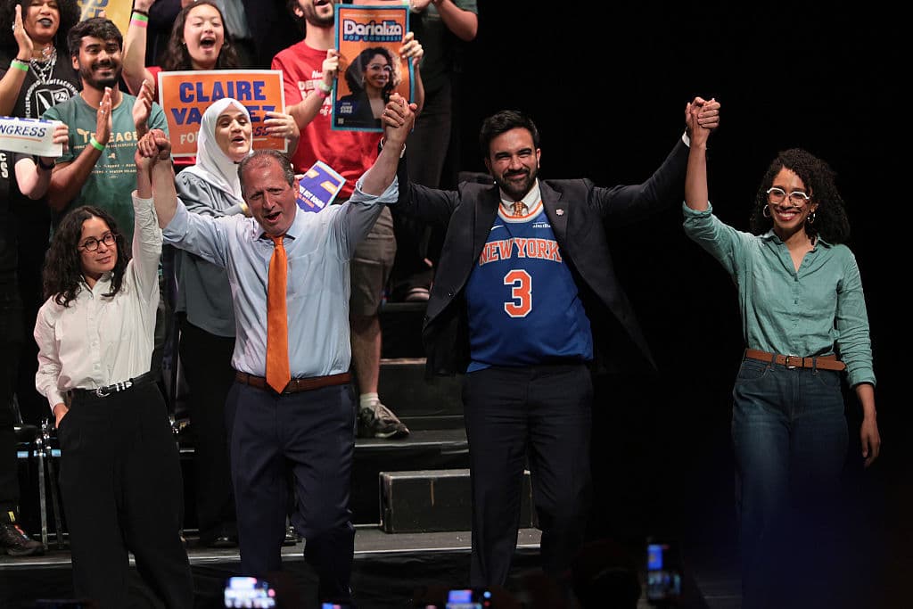 Michael M. Santiago/Getty Images Claire Valdez, Brad Lander, Mayor Zohran Mamdani, and Darializa Avila Chevalier raise their hands during a rally at King's Theater on June 18, 2026 at New York City.