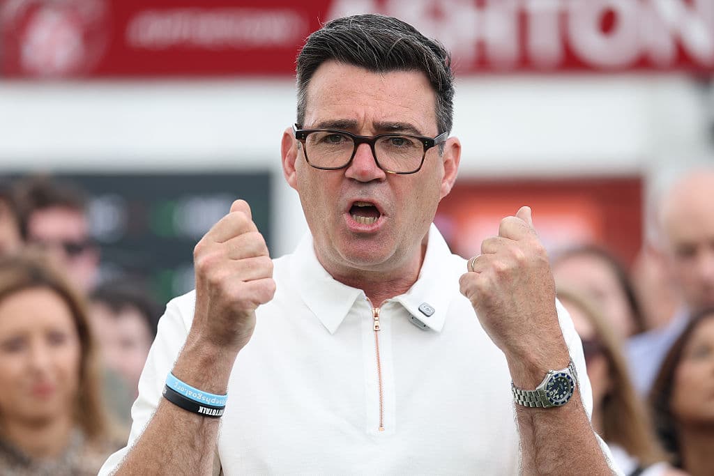 Ryan Jenkinson/Getty Images Andy Burnham celebrates his victory in the Makerfield by-election on June 19, 2026 at Makerfield, England.