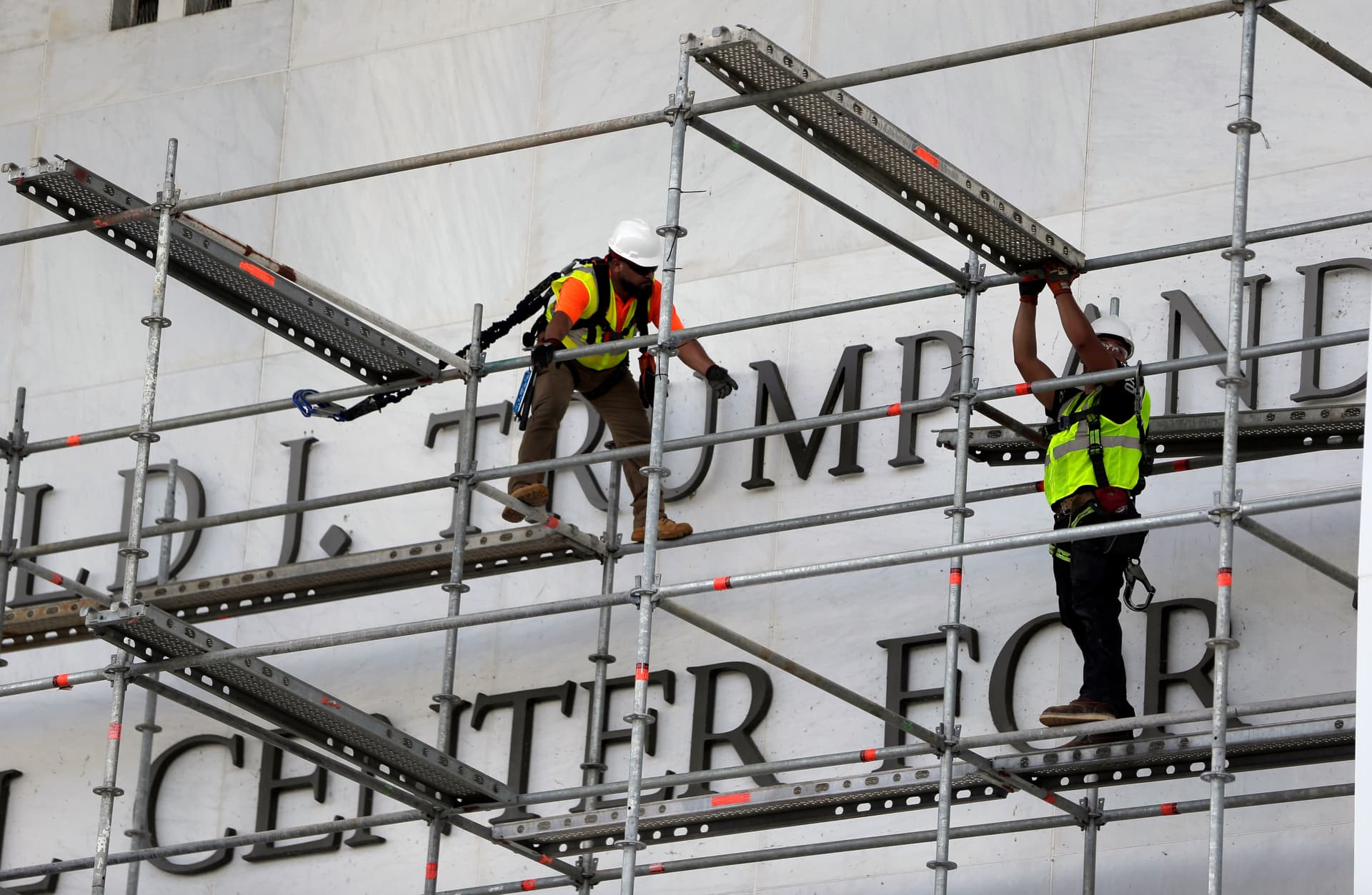 Rahmat Gul/AP Workers construct scaffolding at the sign for the John F. Kennedy Center for the Performing Arts at Washington D.C., on June 12, 2026.