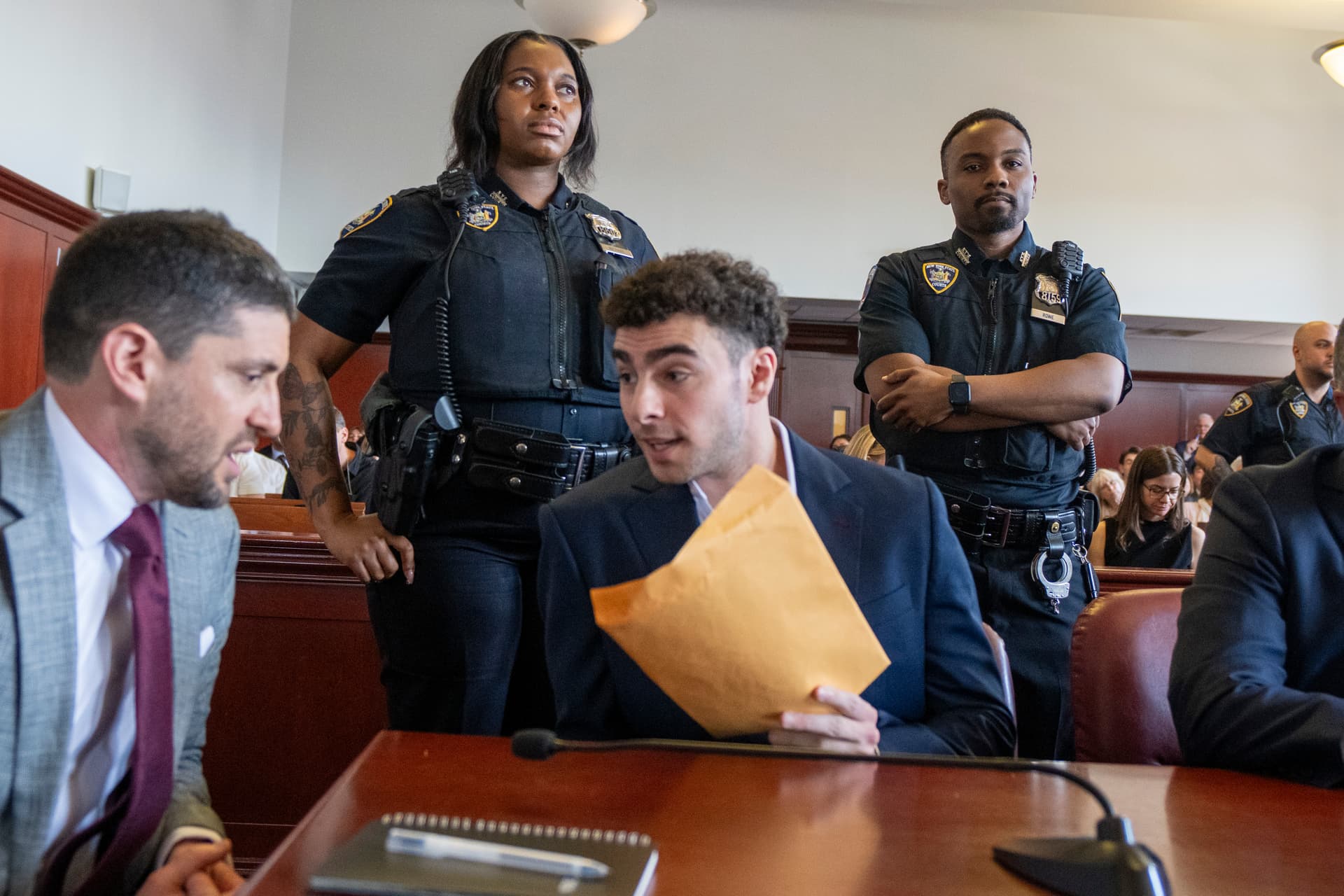Steven Hirsch- Pool/Getty Images Murder suspect Luigi Mangione speaks with his attorney Jacob Kaplan during an appearance in Manhattan Supreme Court at New York City on June 17, 2026.