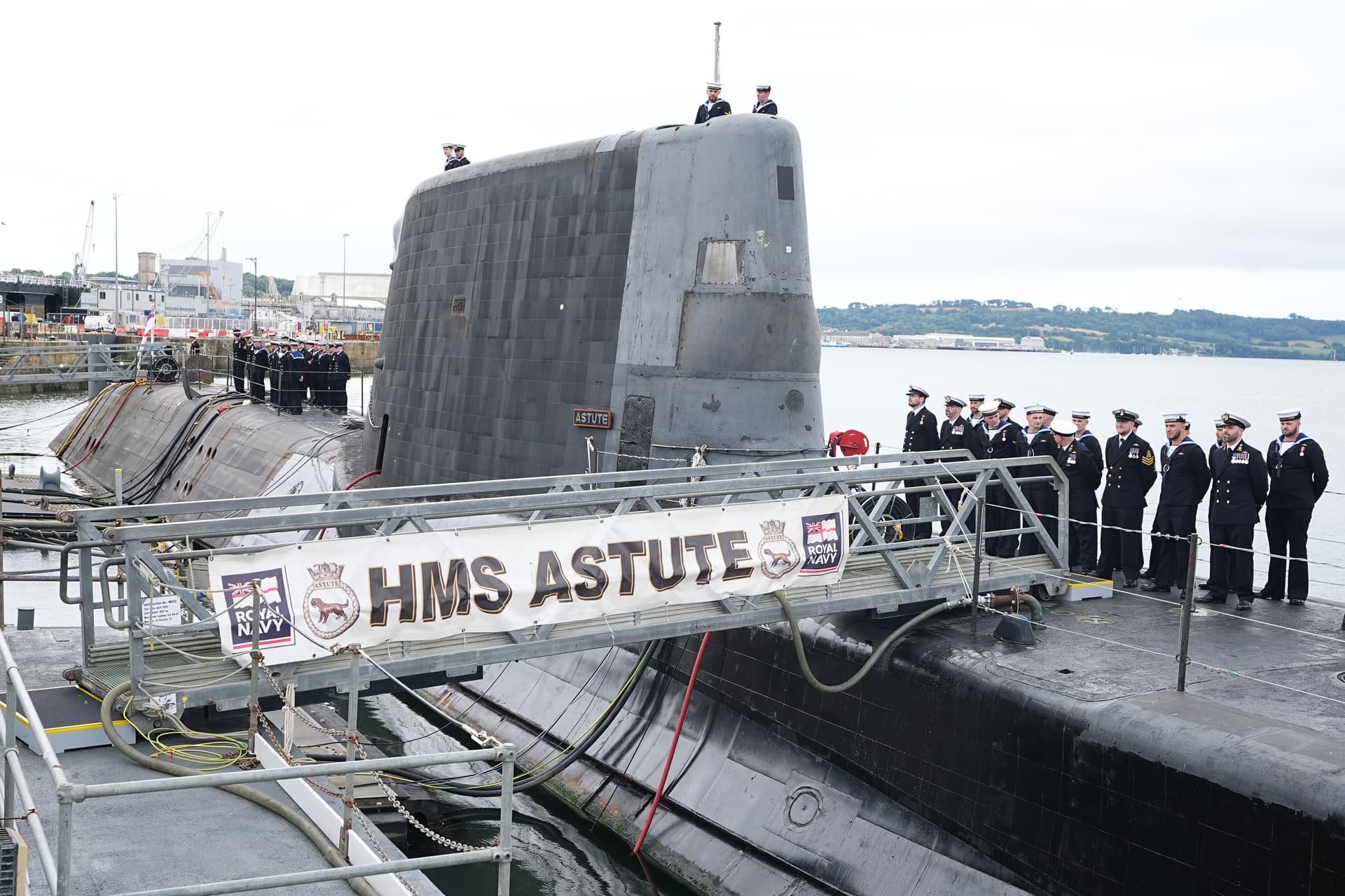 Aaron Chown - WPA pool/Getty Images His Majesty's Ship Astute ahead of a visit by Queen Camilla on July 16, 2025 at Plymouth, England.