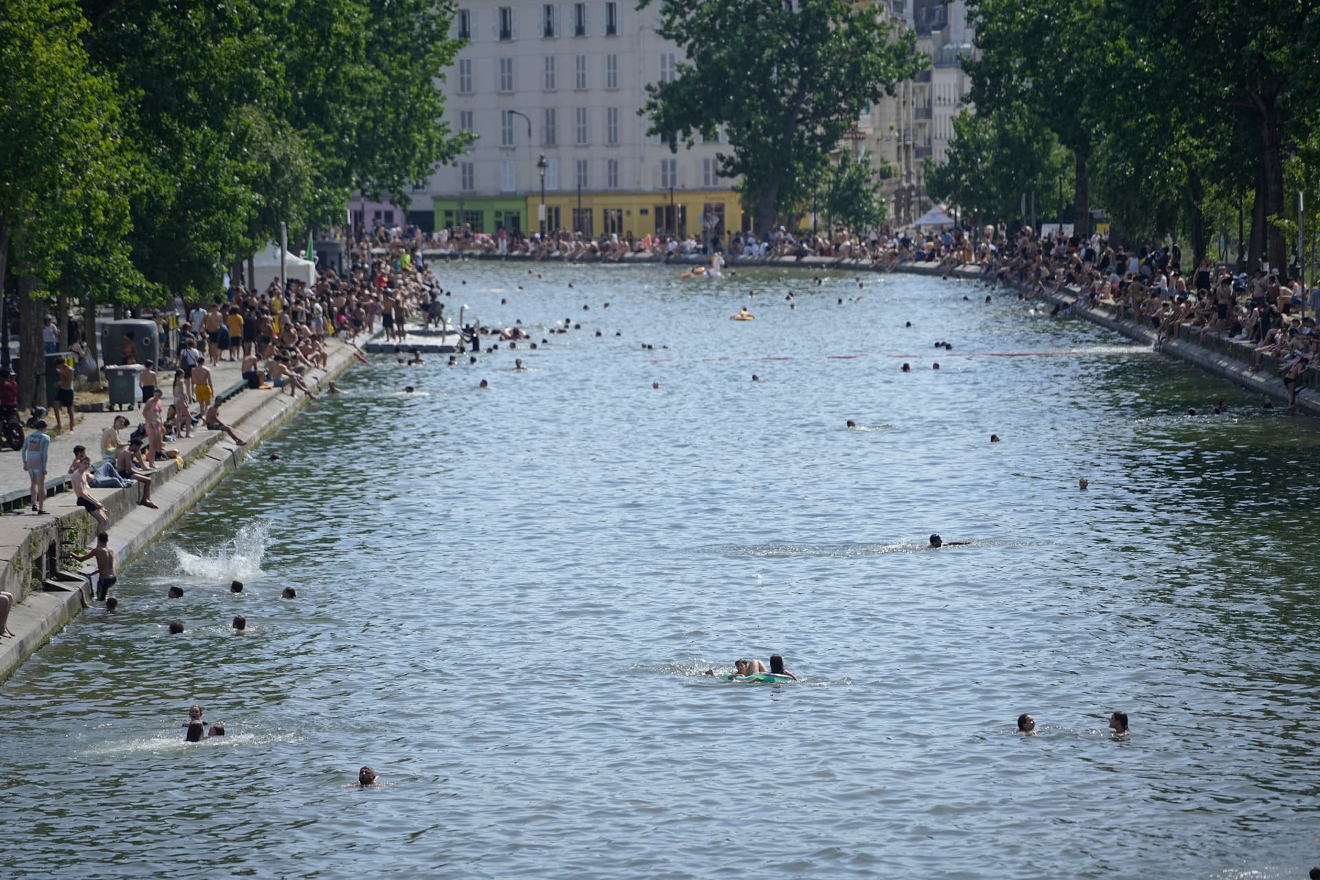 Remon Haazen/Getty Images People are seen swimming in the Canal Saint Martin during a heat wave that has temperatures soaring to well over 40 degrees fahrenheit on June 23, 2026 at Paris, France.