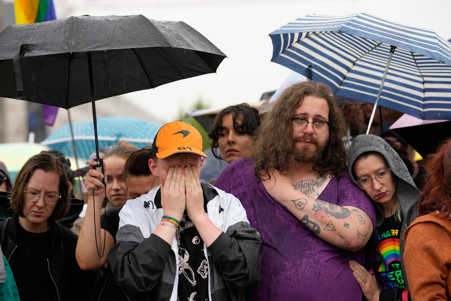 AP/Ebrahim Noroozi People gather outside the Brandenburg Gate for a demonstration in support of LGBTQ+ after a car driven by a suspected Islamic extremist rammed into a crowd at the Pride March at Berlin, July 26, 2026.