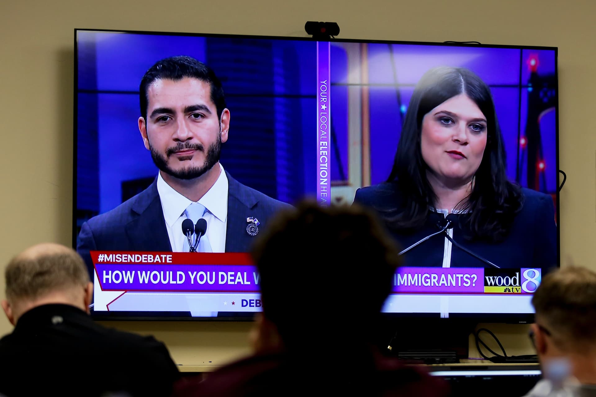 AP/Kristen Norman Michigan U.S. Senate candidates, Abdul El-Sayed, left, and Congresswoman Haley Stevens, are displayed on a television during a debate inside the spin room at WoodTV studios on July 7, 2026, at Grand Rapids, Michigan.