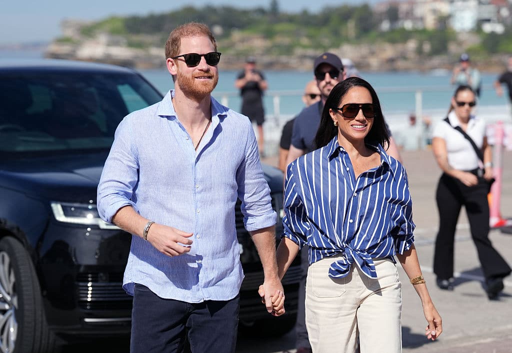 Jonathan Brady/Getty Images Prince Harry, Duke of Sussex and Meghan, Duchess of Sussex during a visit to Bondi Beach, on April 17, 2026 at Sydney, Australia.