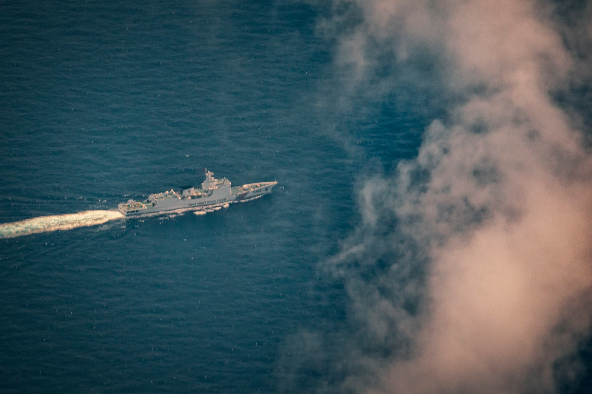 Ezra Acayan/Getty Images A Chinese Coast Guard ship is seen from aboard a Philippine Bureau of Fisheries and Aquatic Resources (BFAR) plane on June 15, 2026, in Scarborough Shoal, South China Sea. Chinese research vessels were recently spotted near Scarborough Shoal as the Philippines protested a suspected Chinese floating platform there, raising fresh concerns that Beijing could be testing steps toward a more permanent presence at the disputed South China Sea flashpoint.