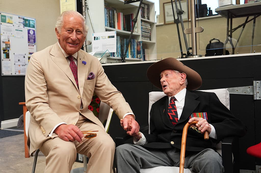 Aaron Chown - WPA Pool/Getty Images King Charles III, Lord of Mann, meets Burma veteran James Fenton, 104, at Port Soderick Beach on July 14, 2026 at Isle of Man.