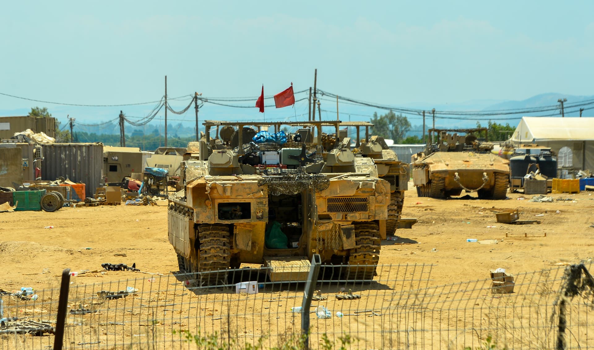 Martin Grimes/Getty Images Israeli military vehicles are seen at Kiryat Shemona near Israel's border with Lebanon on July 7, 2026.