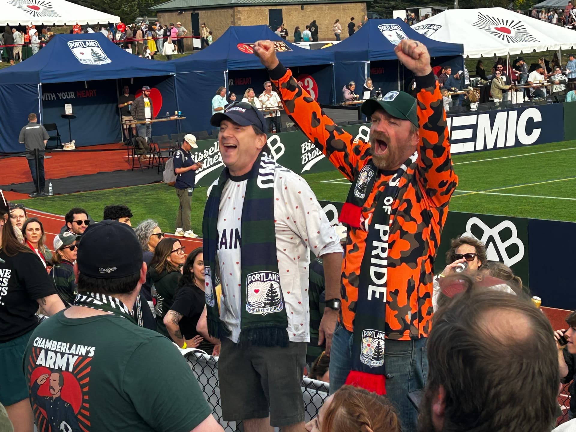MAINEiac4434 - Own work, CC BY-SA 4.0 Graham Platner campaigning with Jackson at a match of Portland's United Soccer League team, Hearts of Pine, in September 2025.
