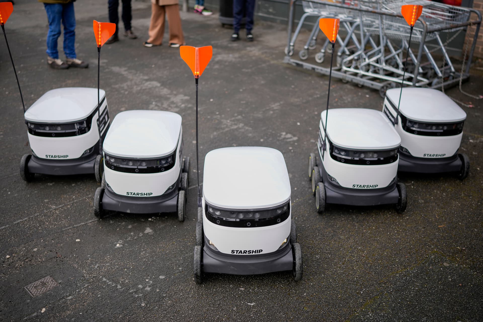Christopher Furlong/Getty Images Starship Technologies robotic vehicles park outside a supermarket at Manchester, England, on March 15, 2023.