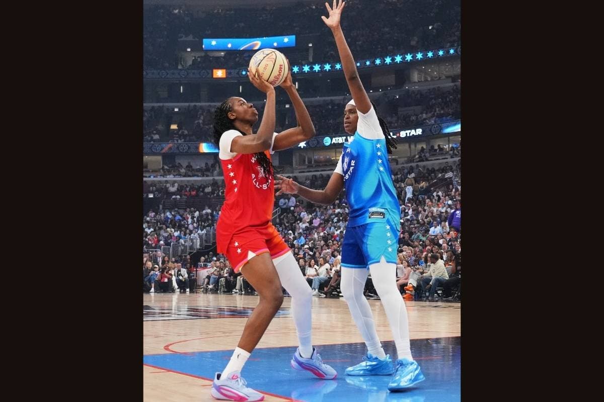AP/Nam Y. Huh Team Spoon's Jonquel Jones, right, guards against Team Coop's Dominique Malonga during the second half of the WNBA All-Star basketball game at Chicago, July 25, 2026.