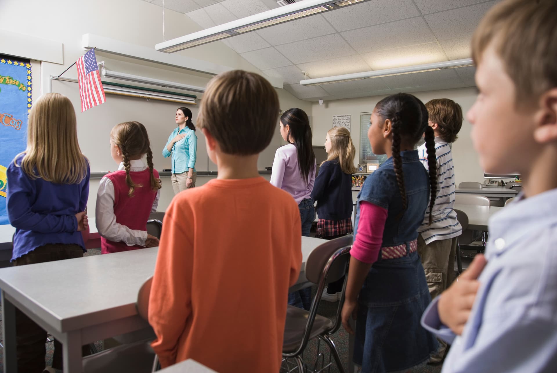 Getty Images A bill is pending in Congress to mandate the return of the pledge to public schools.