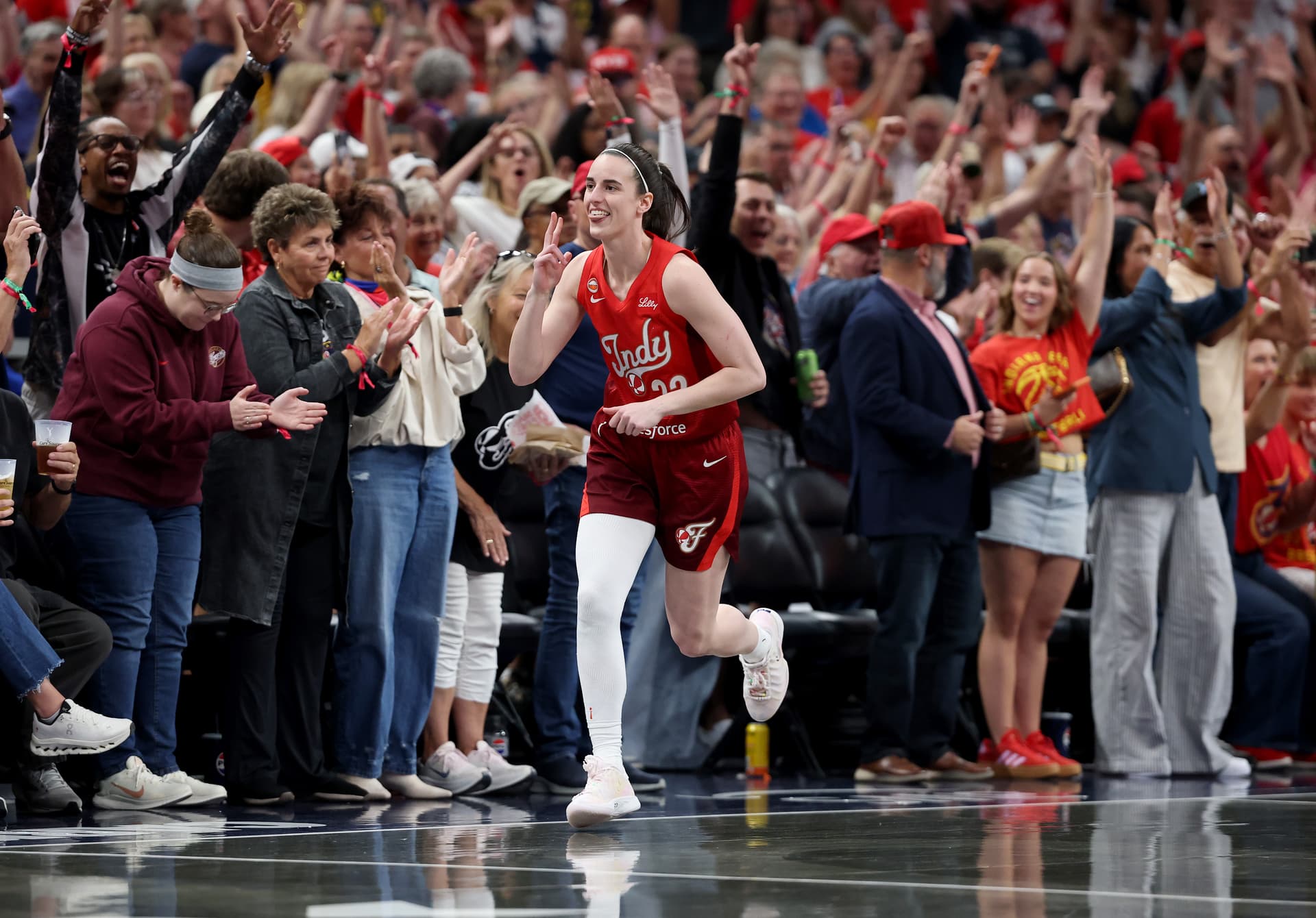 Andy Lyons/Getty Images Caitlin Clark of the Indiana Fever celebrates after a basket against the Connecticut Sun at Gainbridge Fieldhouse at Indianapolis on August 28, 2026.
