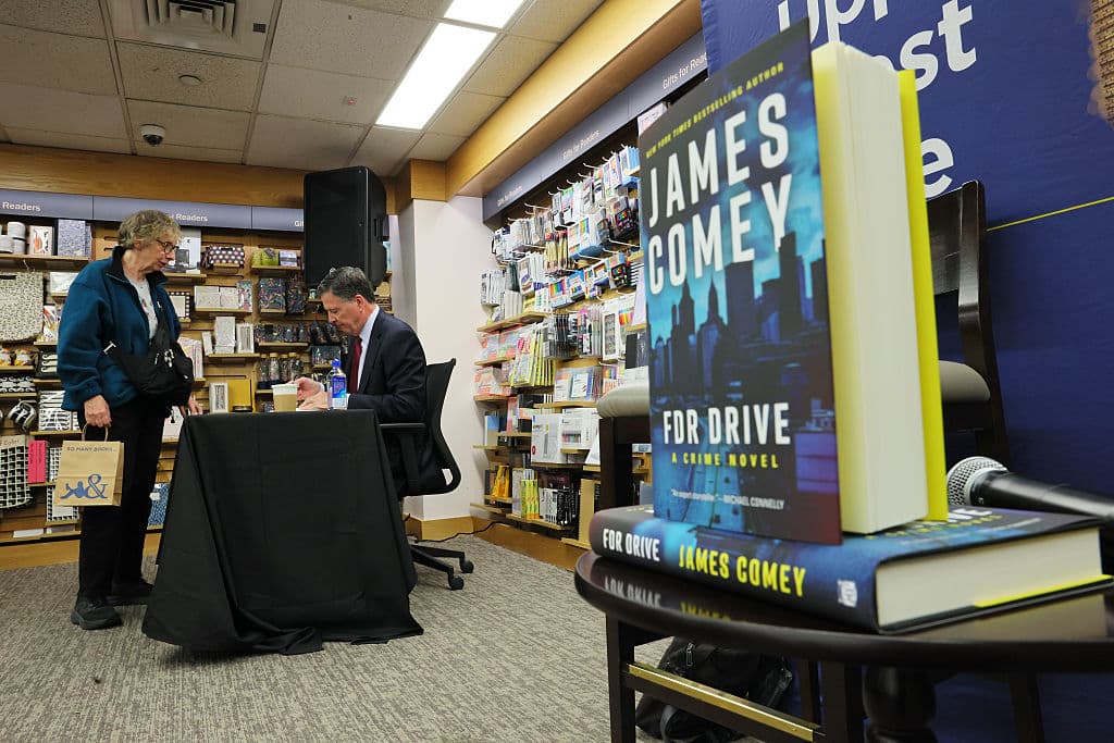Michael M. Santiago/Getty Images Author James Comey, former FBI Director, signs copies of his books at Barnes & Noble on May 19, 2025, at New York City.