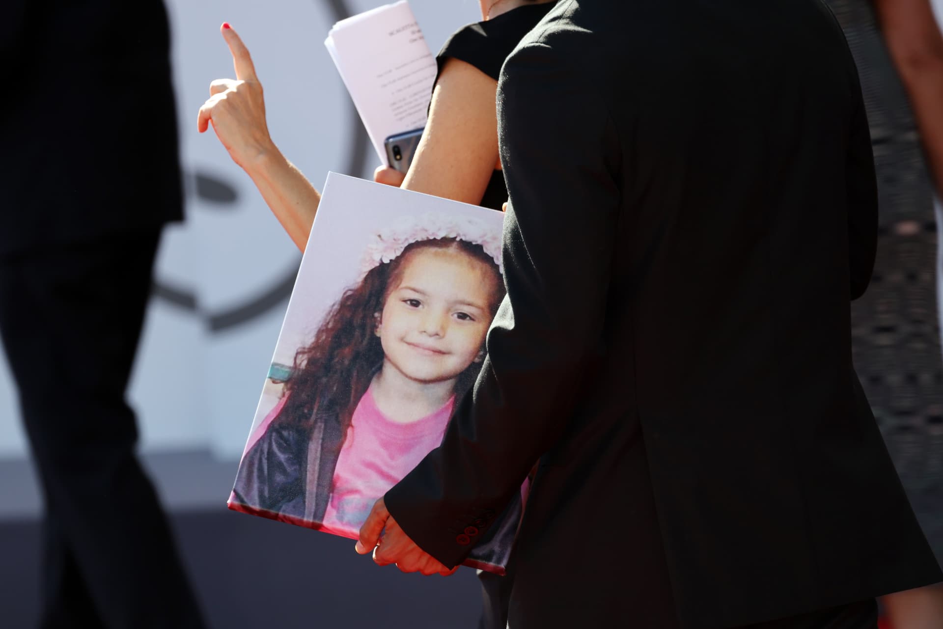 Massimo Rosi/Getty Images A portrait of Hind Rajab held by Motaz Malhees during the "The Voice Of Hind Rajab" red carpet during the 82nd Venice International Film Festival on September 03, 2025, at Venice, Italy.