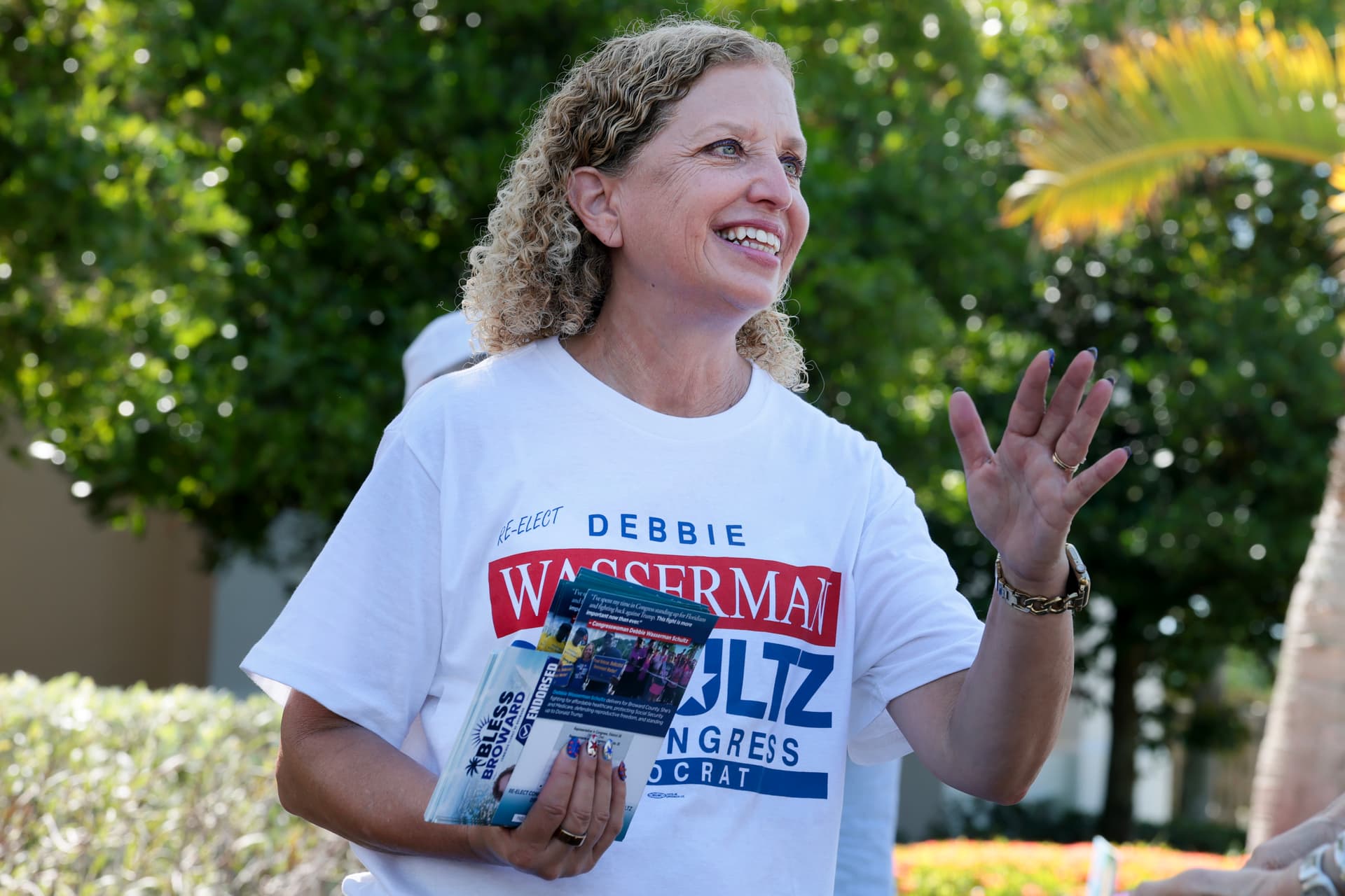 Joe Raedle/Getty Images Congresswoman Debbie Wasserman Schultz campaigns outside of the Kings Point Clubhouse polling station on August 18, 2026, at Tamarac, Florida.
