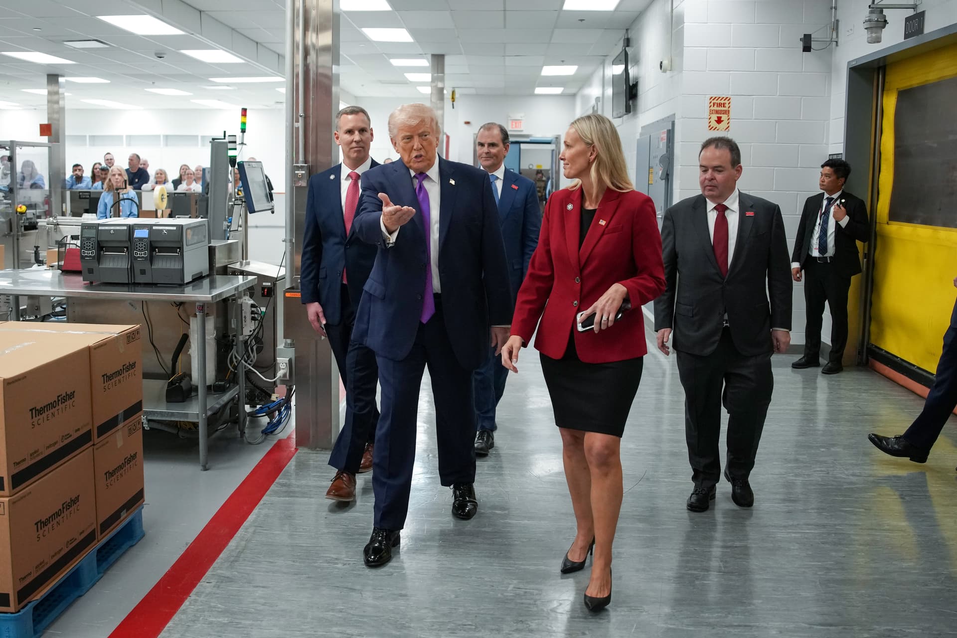 Andrew Harnik/Getty Images President Trump tours a Thermo Fisher Scientific facility at Reading, Ohio, on March 11, 2026.
