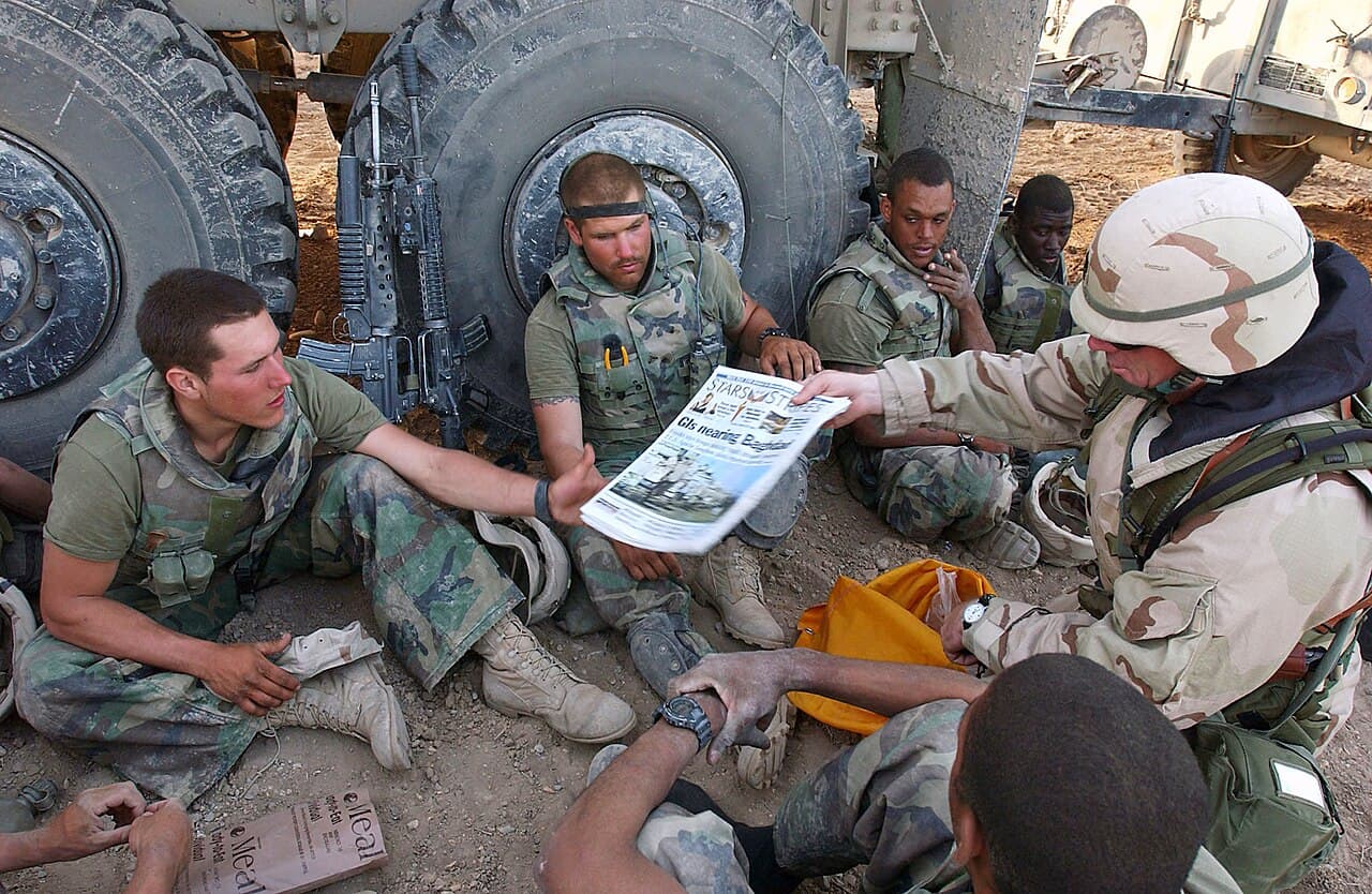 United States Marine Corps via Wikimedia Commons Copies of Stars and Stripes are delivered to Marines during Operation Iraqi Freedom, April 2003.