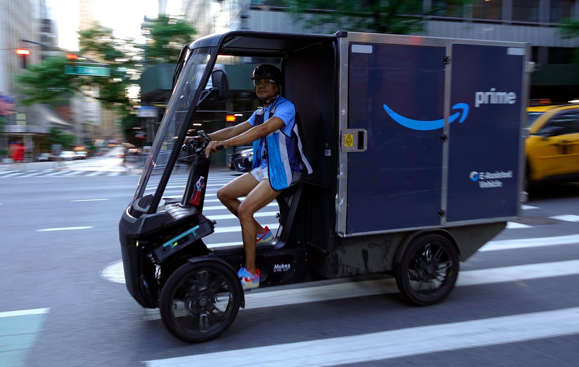 Gary Hershorn/Getty Images An Amazon delivery vehicle on June 15, 2026, at New York City.