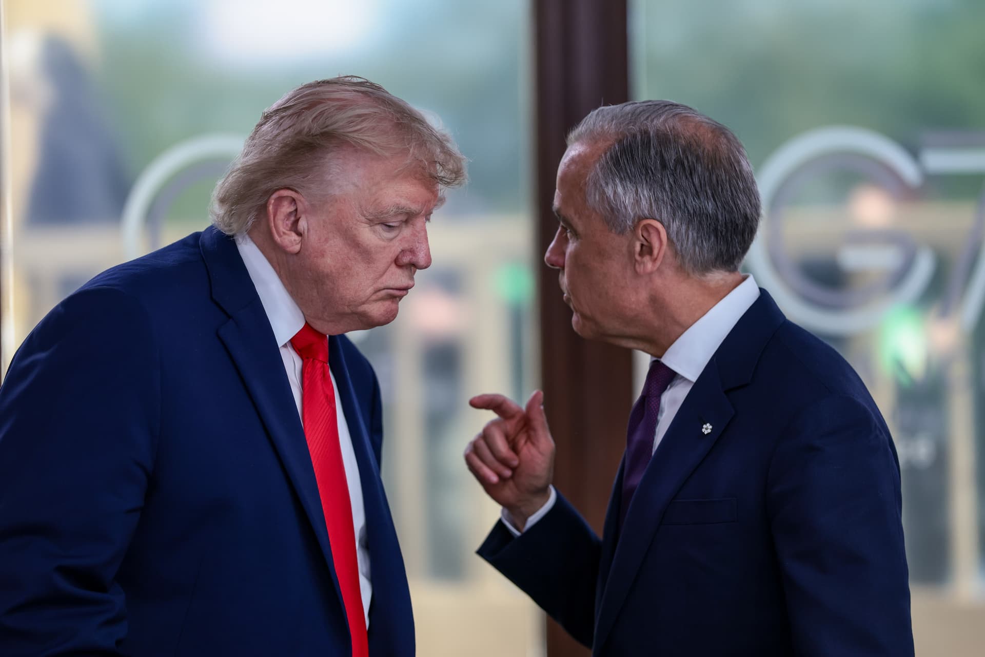 Evelyn Hockstein - pool/Getty Images President Trump speaks with Prime Minister Mark Carney at the G7 conference on June 16, 2026 at Evian-les-Bains, France.