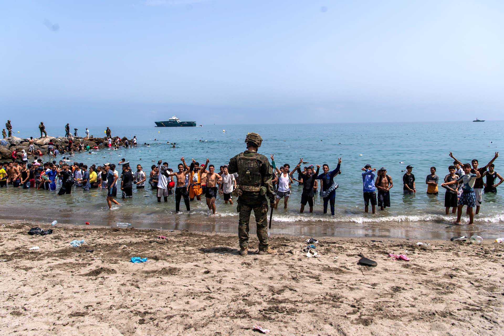 AP/Antonio Sempere Spanish army soldiers block access to the beach for people crossing from Morocco into the Spanish enclave of Ceuta, July 31, 2026.