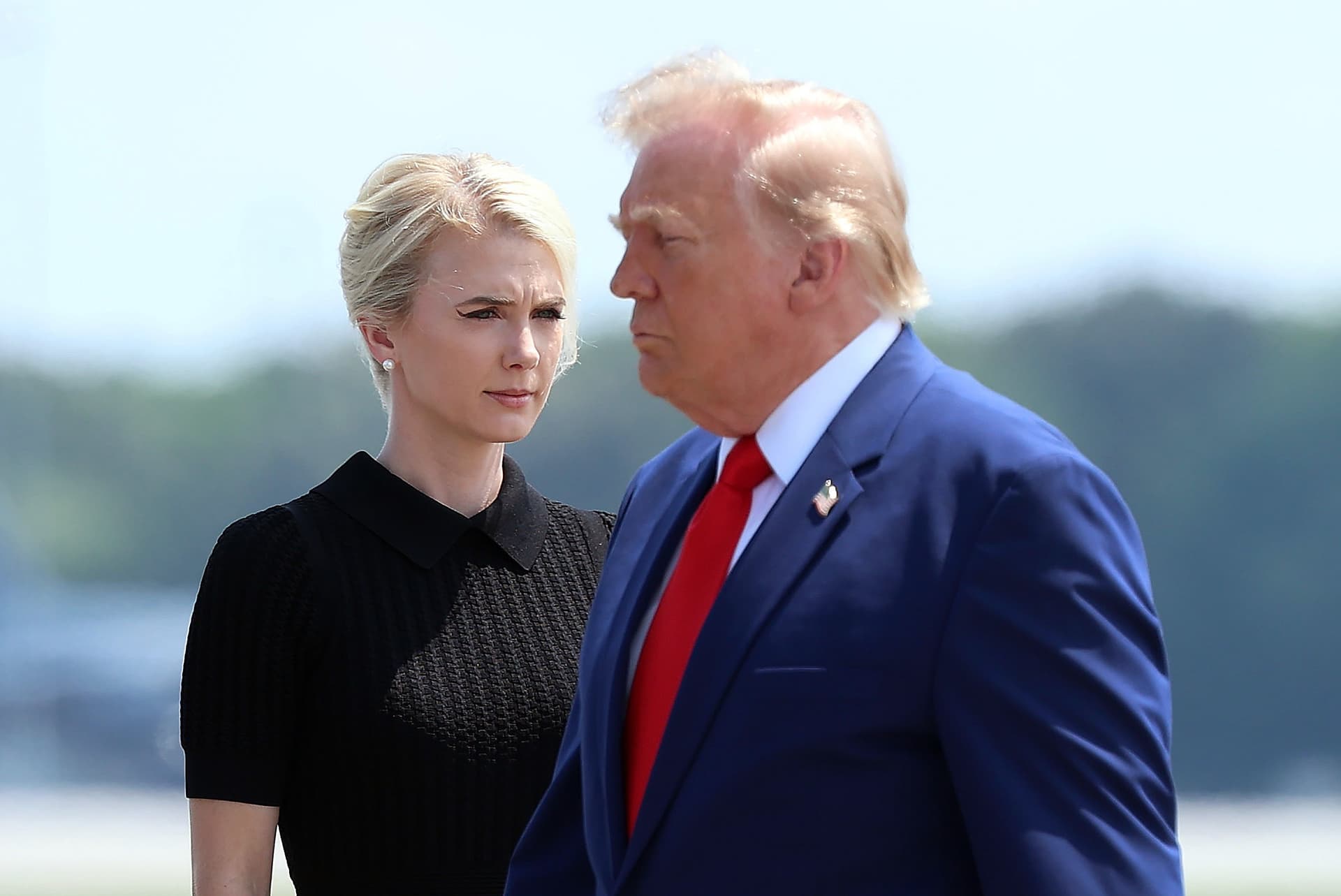 Photo by Kevin Dietsch/Getty Images
The executive assistant to the president, Natalie Harp, left, and President Trump on July 22, 2026 at Dover, Delaware.