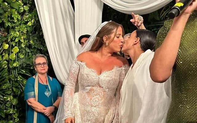 Via WhatsApp Former hostage Emily Damari, right, marries Danielle Amit on August 27, 2026.