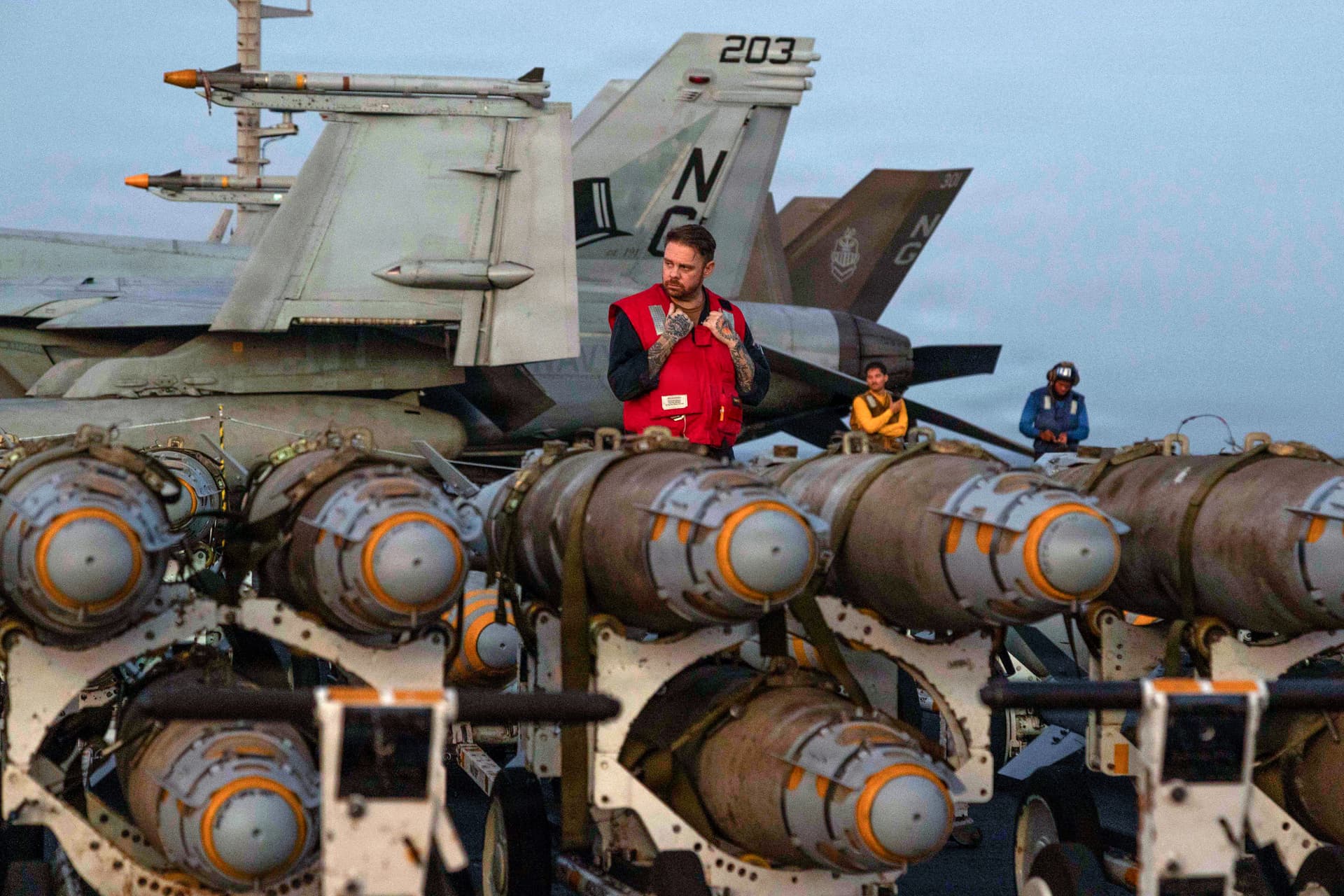 United States Central Command via Getty Images American sailors transfer ordnance on the flight deck of Nimitz-class aircraft carrier United States Ship Abraham Lincoln on February 27, 2026 in the Arabian Sea.
