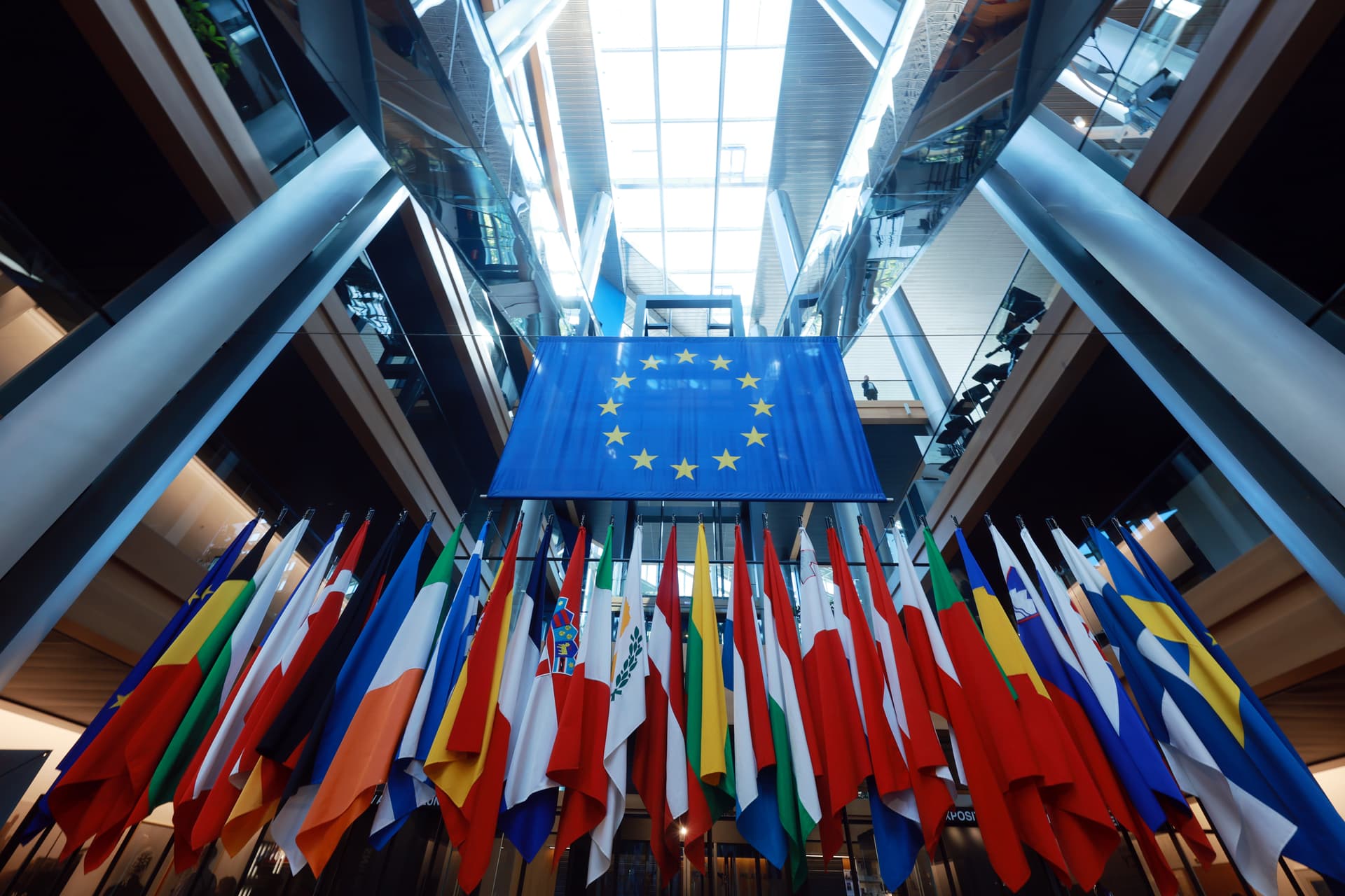 Johannes Simon/Getty Images Flags of member states of the European Union stand in an atrium of the European Parliament building in Strasbourg, France.