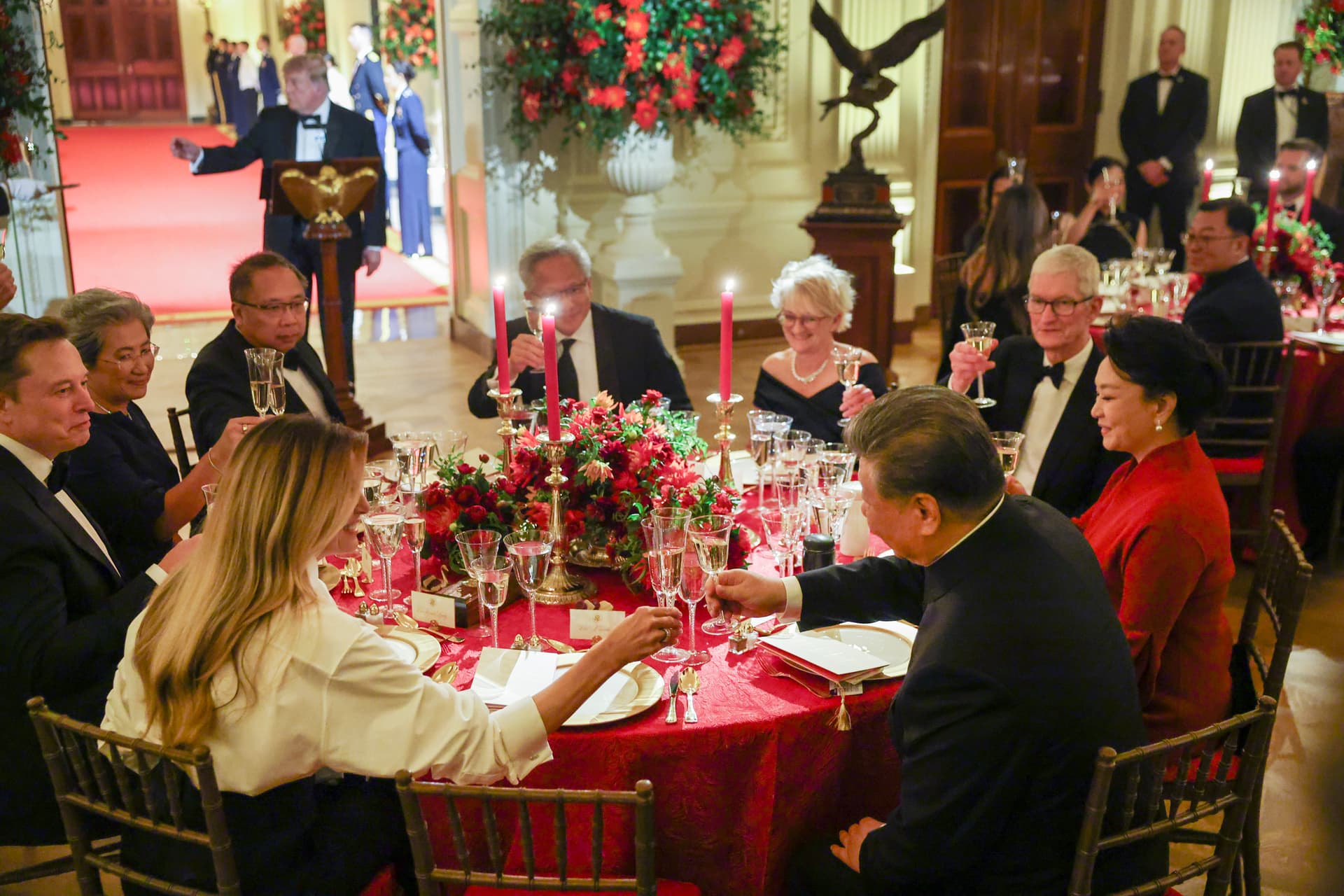 Kevin Dietsch/Getty Images President Xi Jinping clinks glasses with first lady Melania Trump as President Trump speaks during a state dinner in the East Room of the White House on September 24, 2026.