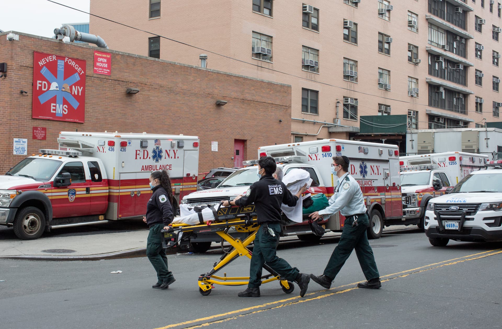 Andrew Lichtenstein/Corbis via Getty Images. Ambulances outside Elmhurst Hospital's trauma unit in Queens, New York.