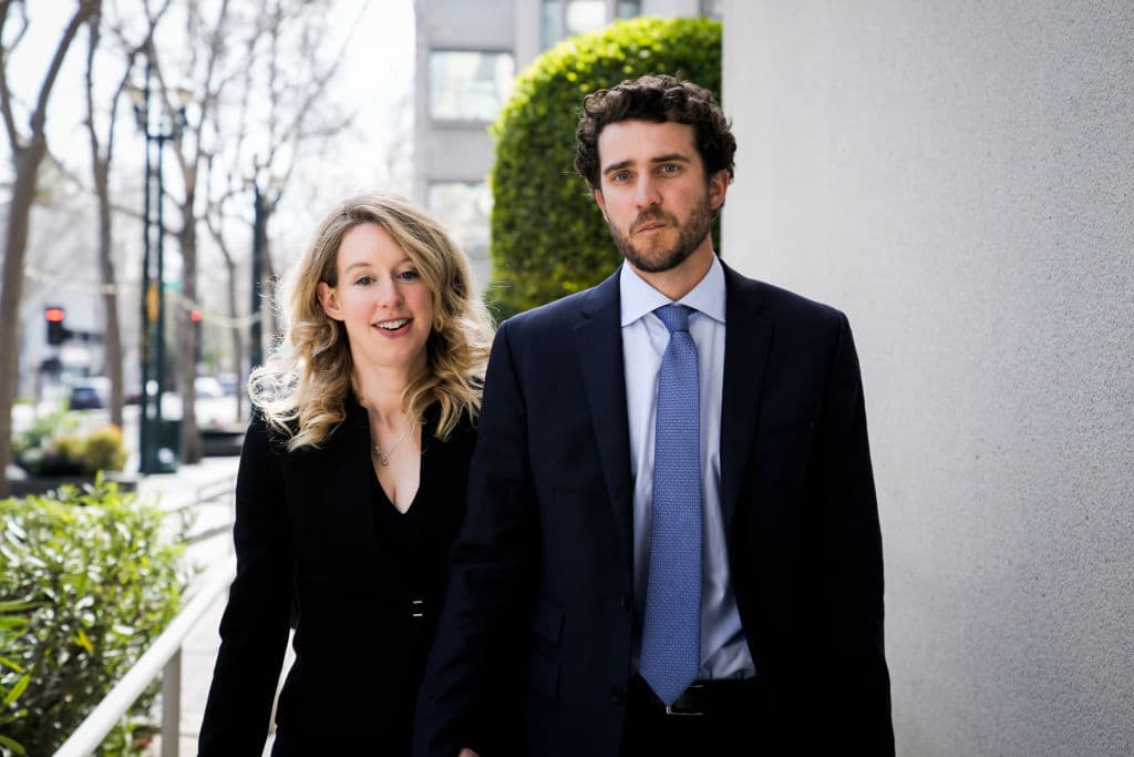 Philip Pacheco/Getty Images Elizabeth Holmes and her boyfriend Billy Evans leave a hearing at the Robert E. Peckham U.S. Courthouse on March 17 2023 in San Jose, California.