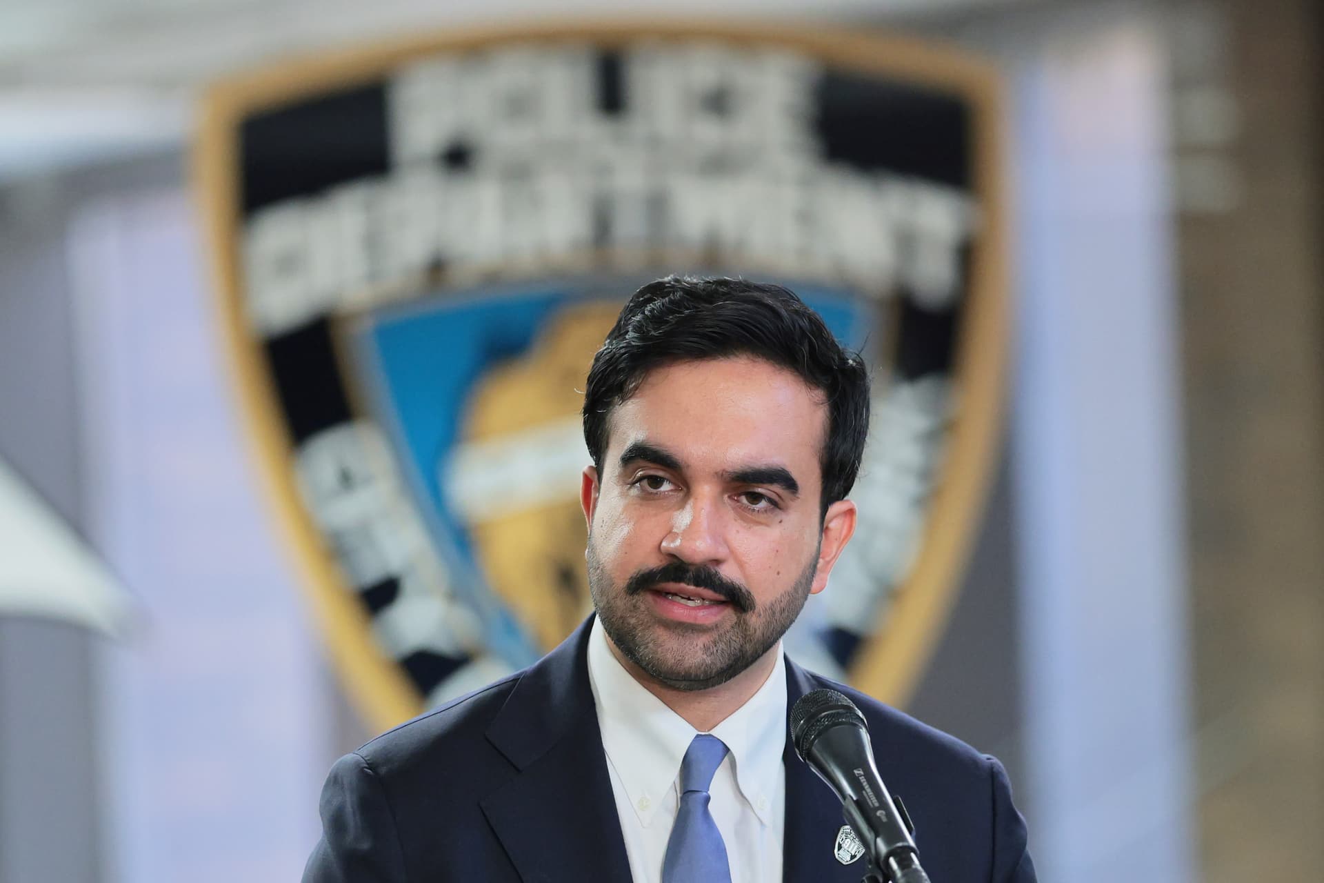 Michael M. Santiago/Getty Images Zohran Mamdani speaks during an unveiling ceremony for a new 9/11 Memorial Wall at One Police Plaza.
