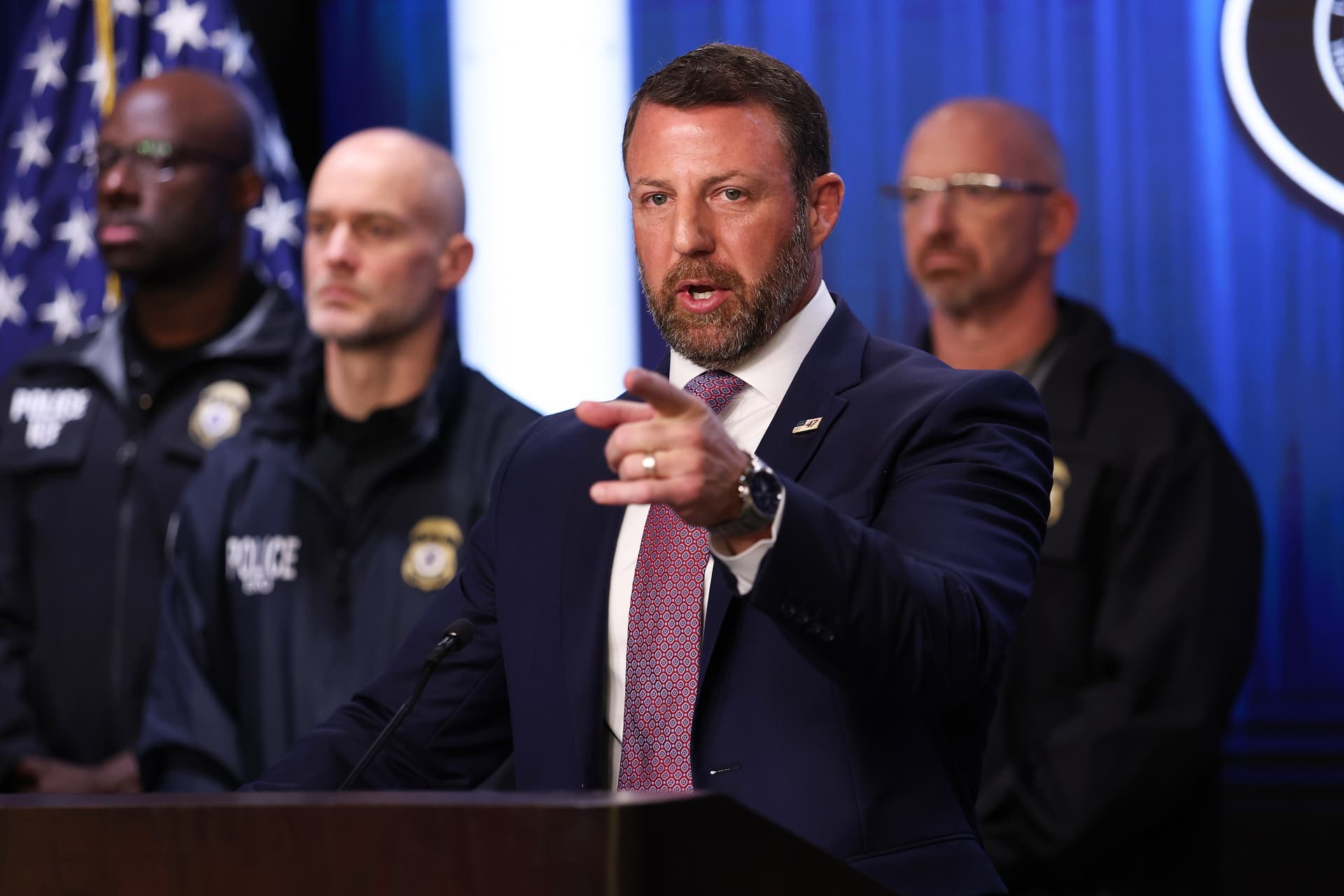 Kevin Dietsch/Getty Images. U.S. Secretary of Homeland Security Markwayne Mullin takes questions from reporters during a press conference at U.S. Immigration and Customs Enforcement (ICE) headquarters.