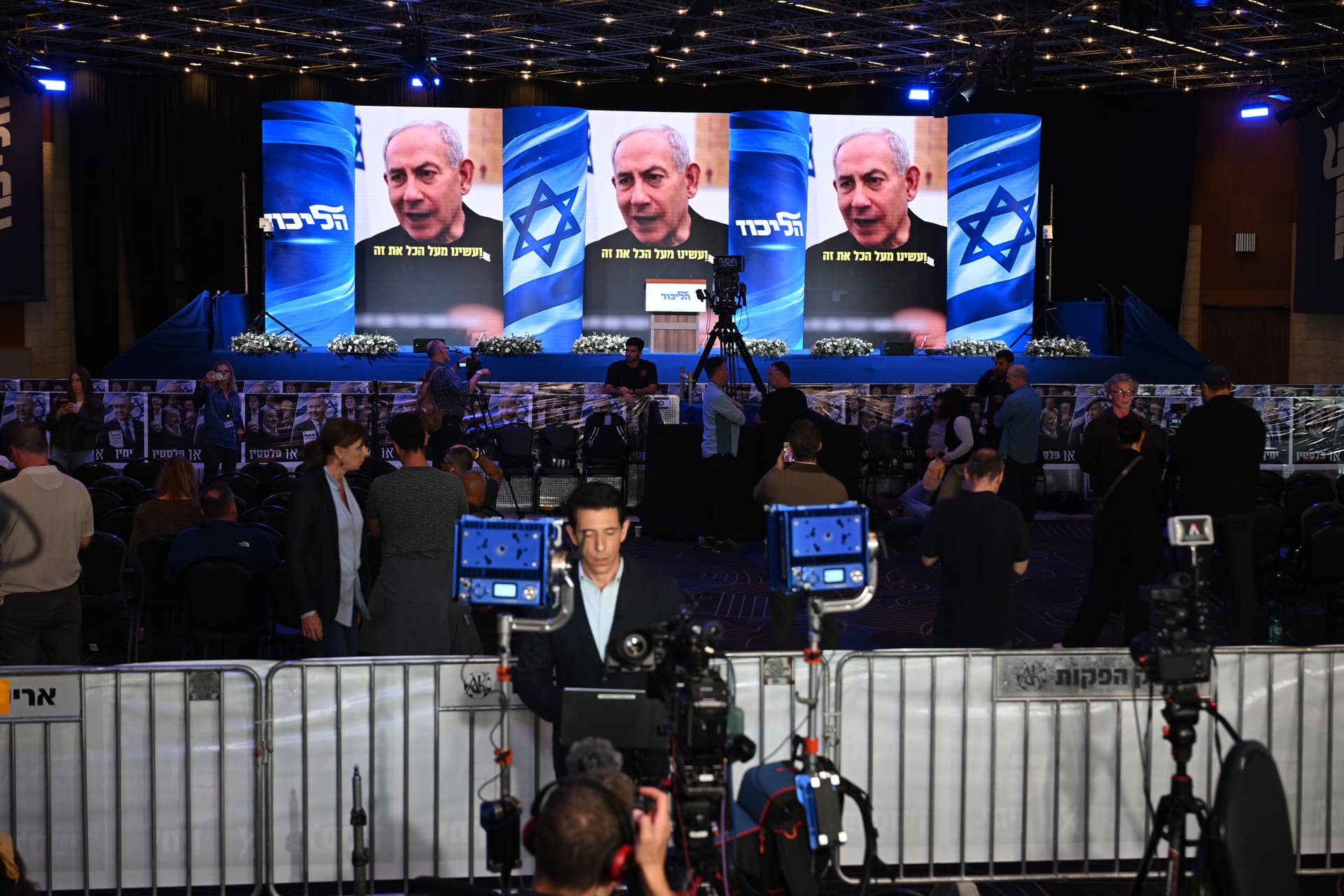 Alexi J. Rosenfeld/Getty Images. Members of the media working and conducting on camera interviews at the Likud Party election-night event at Teddy Hall, International Convention Center in Jerusalem.