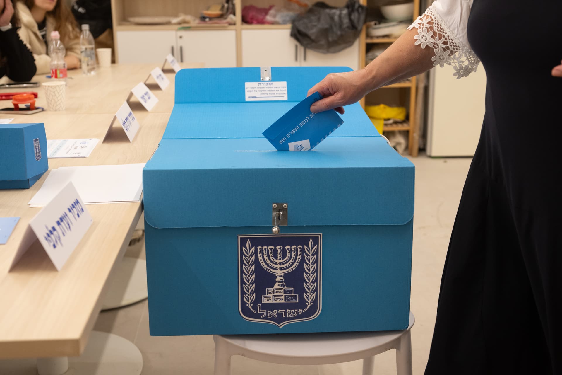 Noam Galai/Getty Images A voter casts her ballot at a polling station on October 27, 2026 at Jerusalem, Israel.