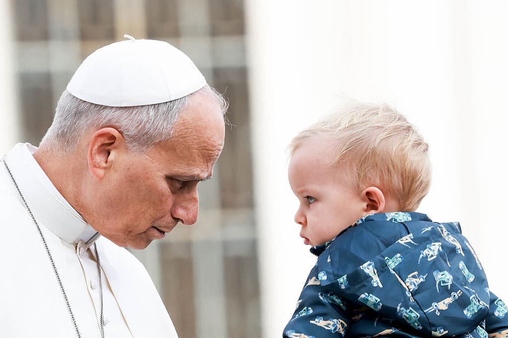 Franco Origlia/Getty Images Pope Leo XIV greets a child on October 28, 2026 at Vatican City, Vatican.