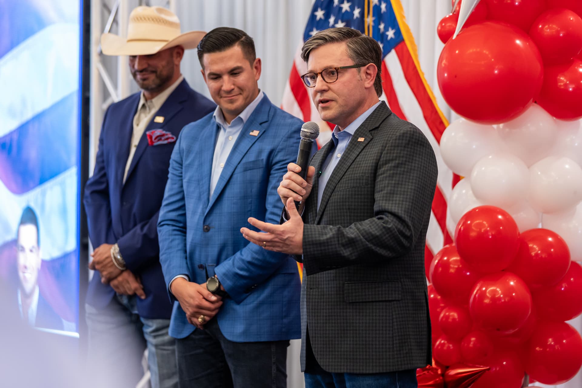 Michael Gonzalez/Getty Images House Speaker Mike Johnson (right) speaks during a rally for Texas GOP candidates at McAllen, Texas, on October 13, 2026.