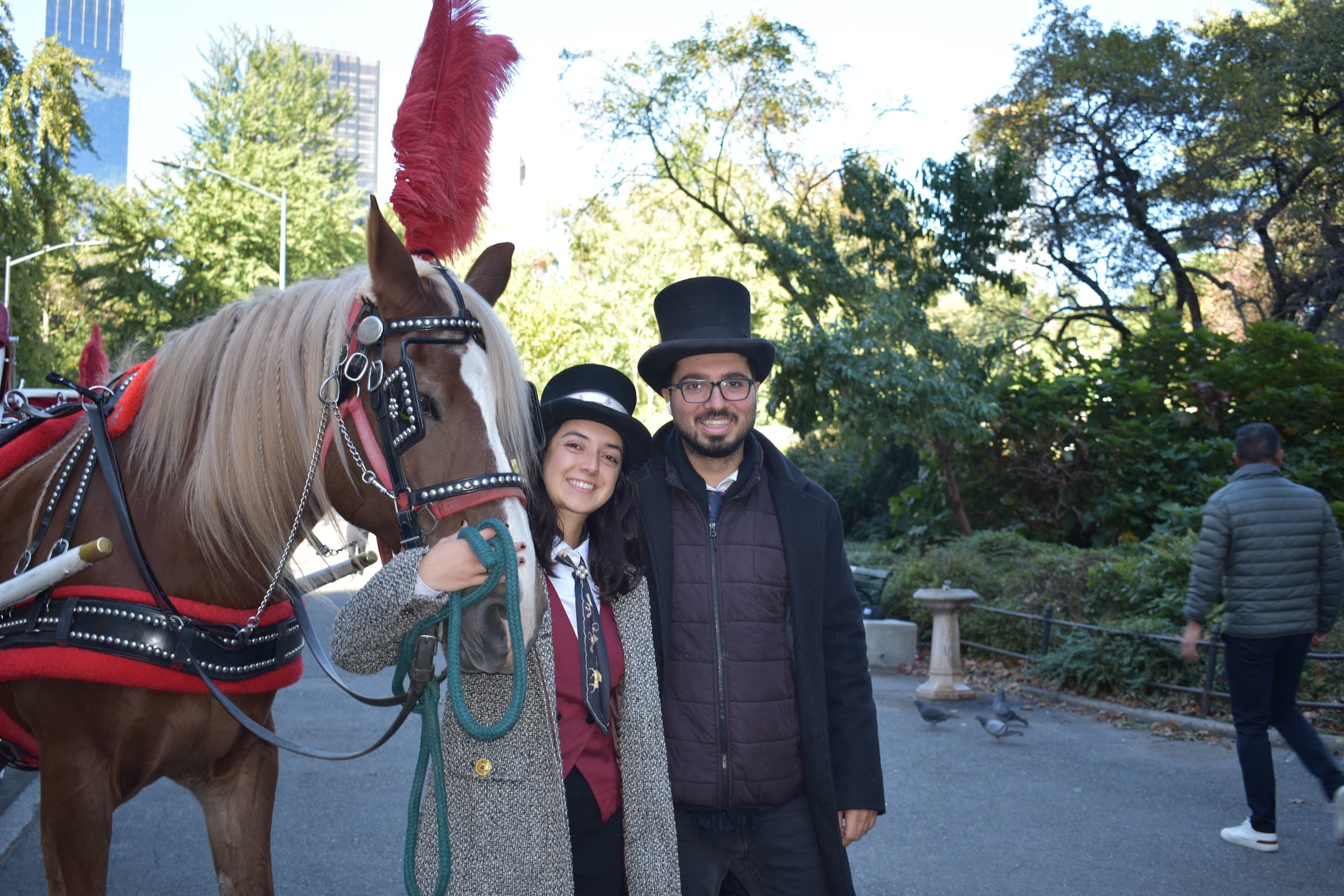 Married carriage driver couple Yusuf and Letty pose with their horse Willy. Married carriage driver couple Yusuf and Letty pose with their horse Willy.