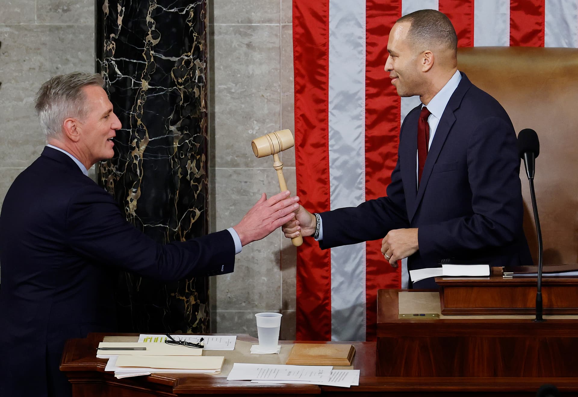 Chip Somodevilla/Getty Images Speaker Kevin McCarthy receives the gavel from the House Democratic leader, Hakeem Jeffries, on January 7, 2023.