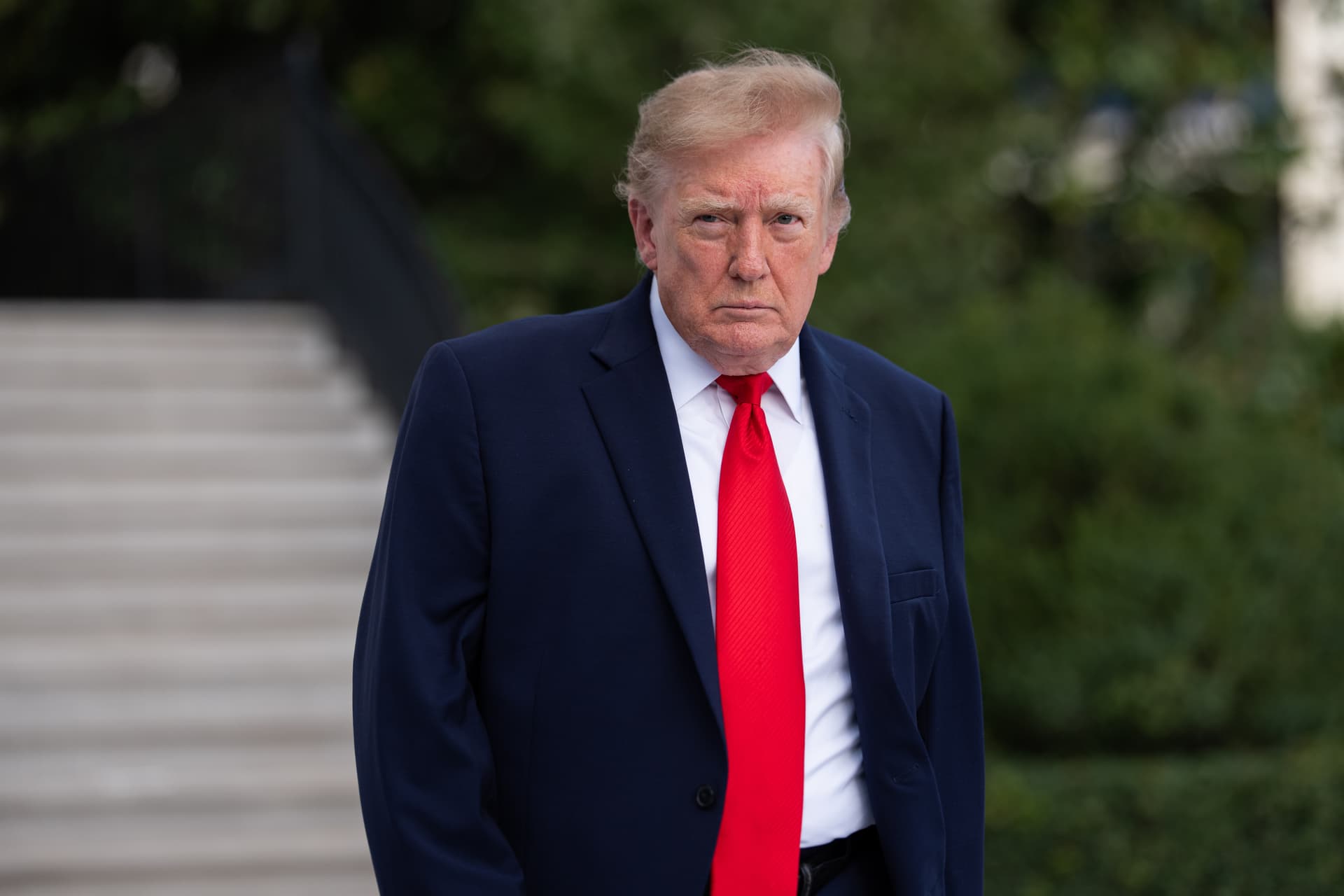 Aaron Schwartz/Getty Images President Trump walks on the South Lawn as he departs the White House on October 12, 2026.